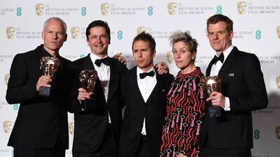The cast and crew of 'Three Billboards outside Ebbing, Missouri' at the awards. From left, director Martin McDonagh, producer Peter Czernin, Best Supporting Actor Sam Rockwell, Best Leading Actress Frances McDormand and producer Graham Broadbent. EPA