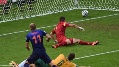 Arjen Robben scores the Netherlands' first goal on Wednesday against Australia at the 2014 World Cup in Porto Alegre, Brazil. Luis Acosta / AFP