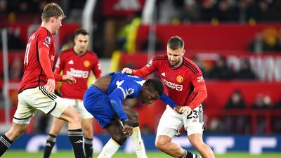 Brings balance, gets forward, improves Manchester United. Booked. Moved centrally in the second half. Getter better. EPA