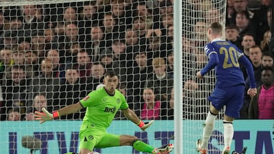 Aston Villa goalkeeper Emiliano Martinez saves from Chelsea's Cole Palmer during the FA Cup fourth match at Stamford Bridge on January 26, 2024. AP