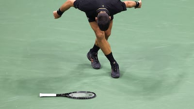 Novak Djokovic of Serbia drops his racquet after losing a point against Cameron Norrie of Great Britain during the third round of the US Open Tennis Championships at the USTA Billie Jean King National Tennis Centre in Flushing Meadows, New York, on Friday August 29. EPA