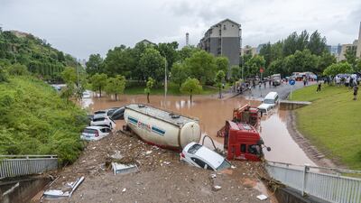 Stricken vehicles in Wanzhou. EPA
