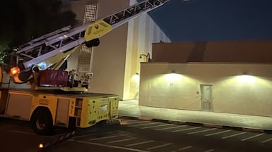 Emergency services tackle a fire caused by an Iranian drone at the US consulate in Dubai. Photo: Dubai Media Office / X