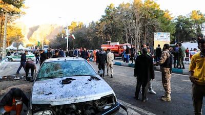 People gather after the explosion in Kerman after an event to mark the fourth anniversary of the Islamic Revolutionary Guard Corps’ Quds Force commander's death. AP