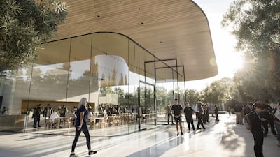 Attendees arrive for the Apple event. Bloomberg