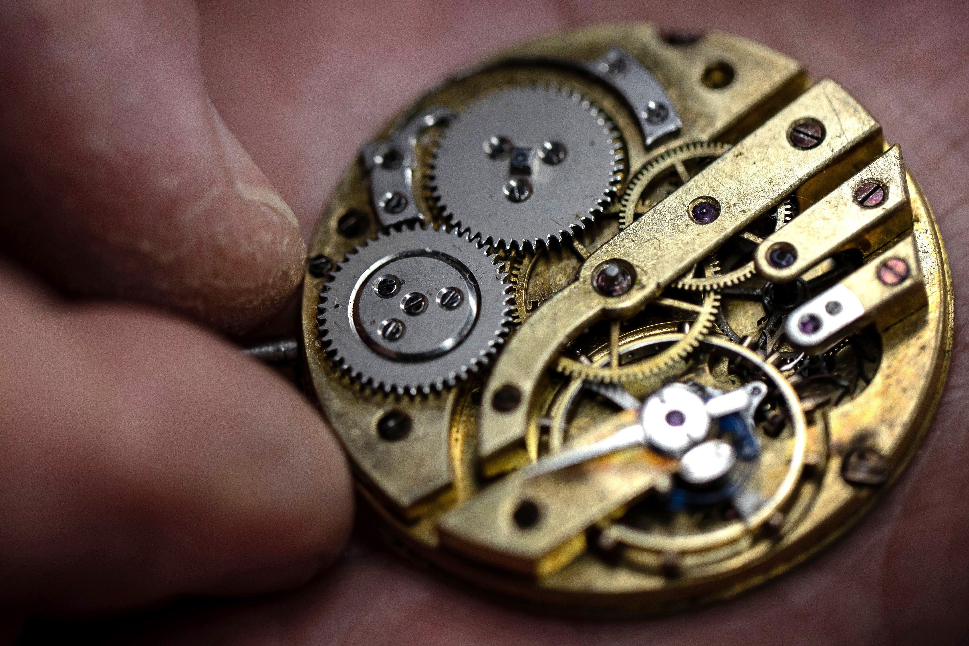 A watchmaker at work. One obvious conclusion about AI is that it threatens traditional forms of expertise. EPA