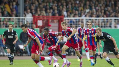 From left, Bayern Munich's Claudia Pizarro, David Alaba, Thomas Mueller, Jerome Boateng and Philipp Lahm charge forward during their German Cup first-round match against Preussen Munster in Munster, Germany, on August 17, 2014. Jorg Sarbach / AP Photo