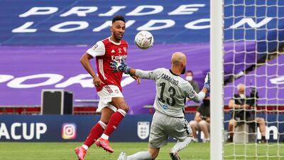 Pierre-Emerick Aubameyang chips home Arsenal's - and his - second goal in their FA Cup final win over Chelsea at Wembley Stadium in London on Saturday, August 1. Reuters