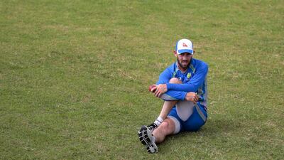 Australia's Glenn Maxwell stretches during a practice session in Dhaka, Bangladesh, Sunday, August 20, 2017. AM Ahad / AP Photo
