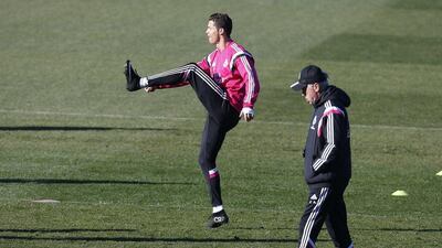 Real Madrid manager Carlo Ancelotti, right, rules over training as Cristiano Ronalo goes through his paces ahead of Saturday's La Liga encounter with Espanyol. J.J. Guillen/EPA