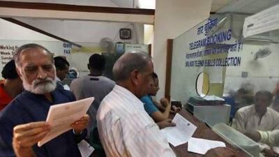Indians queue to send telegram messages at the Central Telegraph Office in New Delhi.