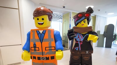 The Lego mascots on display at the launch of the company's new office in Dubai. Leslie Pableo for The National