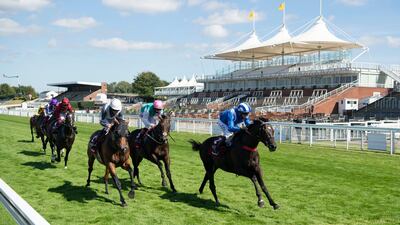 Mohaather, ridden by Jim Crowley, right, wins the Sussex Stakes during day two of the Goodwood Festival at Goodwood Racecourse. PA