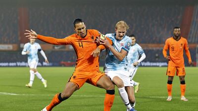 Virgil van Dijk of Netherlands and Moeten Thorsby of Norway in action. EPA