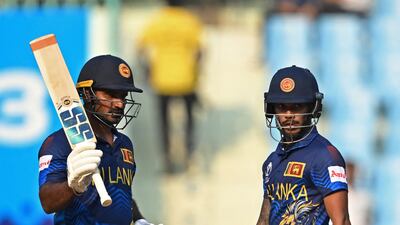 Sri Lanka's Kusal Perera, left, celebrates after reaching his 50 with teammate Pathum Nissanka. AFP