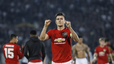 Harry Maguire celebrates with fans after United's 1-0 win at the Partizan Stadium. Getty Images