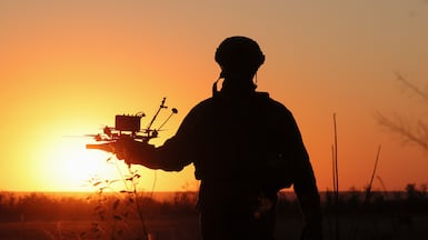 A Ukrainian soldier with an FPV drone, as Russia looks to recruit an army of gamers to help counter them. EPA