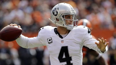 Oakland Raiders quarterback Derek Carr throws a pass in the NFL against the Cleveland Browns last Sunday. Aaron Josefczyk / AP / September 27, 2015