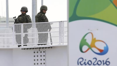 Soldiers stand at a station on Metro Line 4. Nacho Doce / Reuters