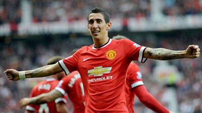 Manchester United's Angel Di Maria celebrates scoring the opening goal in their 4-0 win over Queens Park Rangers at Old Trafford on Sunday. Peter Powell / EPA / September 14, 2014
