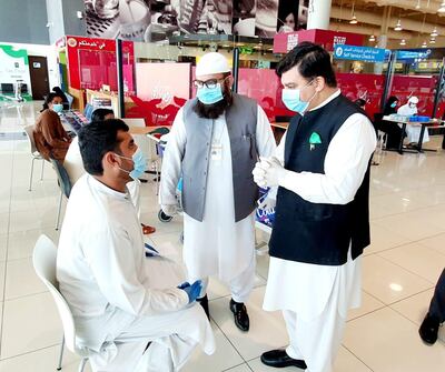 Pakistan consul-general Ahmed Ali at the Dubai International Airport during one of the repatriation flights on May 15. Courtesy: Pakistan Consulate