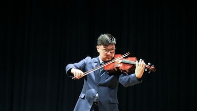 Diwen Xu, 18, plays the viola at Brighton College Abu Dhabi. All pictures by Khushnum Bhandari / The National