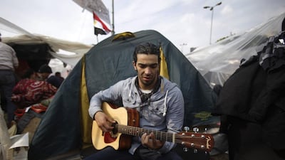 Ramy Essam’s song Irhal (Leave) became an anthem for protesters at Egypt’s Tahrir Square. Michael Robinson Chavez / Los Angeles Times via Getty Images