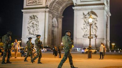 French soldiers patrol near the Arc de Triomphe in Paris. EPA