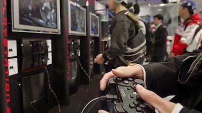 The company's video game network has been down for close to a week following the attack. Katsumi Kasahara / AP Photo