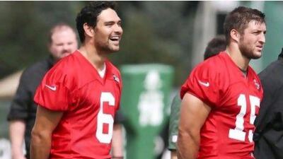 New York Jets head coach Rex Ryan says he knows how his starting quarterback is, and that would be Mark Sanchez, left, but acknowledges the competition between Sanchez and Tim Tebow, right, who will have special formations designed around him.