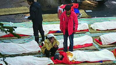 Relatives grieve at the Sizhuang Coal Mine in China's Yunnan province last month after a gas leak killed 20 miners.