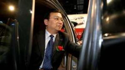 Clockwise from left - Wang Chuanfu, the chairman of BYD.