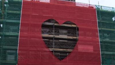Brad Downey's Ladder Stick-Up is made of protective netting and is draped over a Scottish building site.
