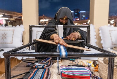 Local women demonstrate their craft to the visitors at Qasr Al Hosn. Ruel Pableo for The National