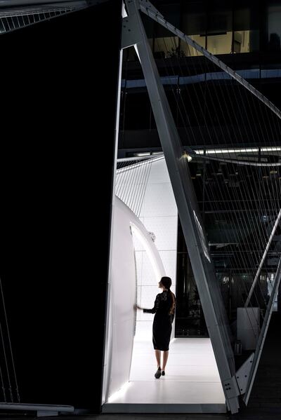 A woman walks into the Audi Innovation Hub. Photo by Tushar Naik