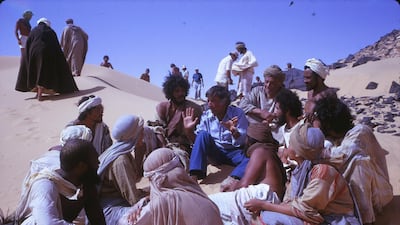 Despite the cinema ban, audiences across the region acquired bootleg video cassettes and DVDs, and it is now a firm favourite on regional television schedules. Pictured: Mustapha Akkad speaking to actors on set