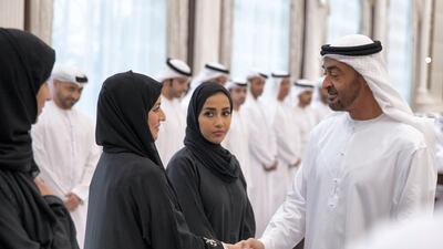 Sheikh Mohamed bin Zayed, Crown Prince of Abu Dhabi and Deputy Supreme Commander of the UAE Armed Forces (right), receives members of Ministry of Presidential Affairs, during an iftar reception at Abu Dhabi's Al Bateen Palace.