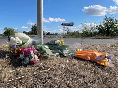Flowers were left at the side of the A10 motorway at Southery in Norfolk after the death of motorbike rider Matthew Day on August 26. PA
