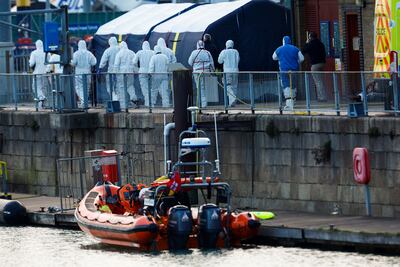 Forensic investigators at the Port of Dover after a small boat capsized on December 14. Reuters