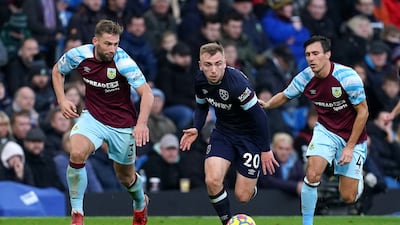 West Ham midfielder Jarrod Bowen tries to break clear against Burnley. AFP