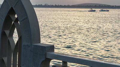 ABU DHABI, UNITED ARAB EMIRATES. 20 AUGUST 2018. Sunset in the capitol on the corniche on the first day of Eid Al Adha. (Photo: Antonie Robertson/The National) Journalist: None. Section: National.