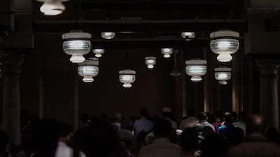 Muslim men take part in the evening prayers during Laylat al Qadr at al-Azhar mosque in Cairo, Egypt, on June 11, 2018. Mohamed El Shahed / AFP