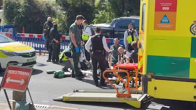 Emergency personnel work at the site of a stabbing incident in Golders Green. Reuters