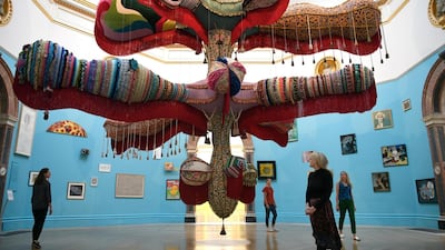 People view the work 'Royal Valkyrie' by Portuguese artist Joana Vasconcelo during the media preview of Summer Exhibition at the Royal Academy of Arts in London. EPA