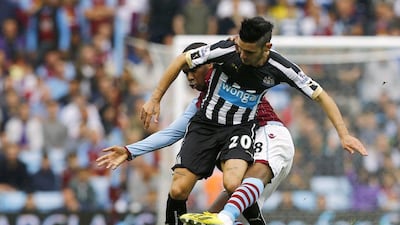 Aston Villa's Charles N'Zogbia, behind, challenges Newcastle United's Remy Cabella, front, during their 0-0 draw in the English Premier League on Saturday. Darren Staples / Reuters / August 23, 2014