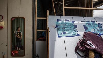 A resident stands in the house damaged by Typhoon Nepartak in Taitung, Taiwan. Billy H C Kwok / Getty Images