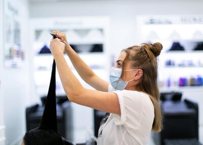 A client gets her hair done at Pastels Salon in Mercato Mall. Reem Mohammed/The National