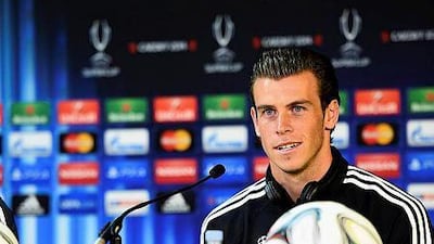 Real Madrid's Gareth Bale attends a news conference before the team's UEFA Super Cup soccer match against Sevilla at Cardiff City Stadium, Wales, August 11, 2014. REUTERS/Uefa