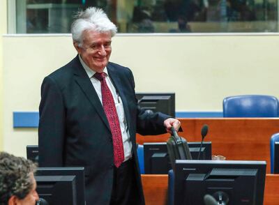 Former Bosnian Serb leader Radovan Karadzic appears in a courtroom before the International Residual Mechanism for Criminal Tribunals (MICT), which is handling outstanding war crimes cases for the Balkans and Rwanda, in The Hague, Netherlands, on April 23, 2018. Yves Herman / EPA Photp