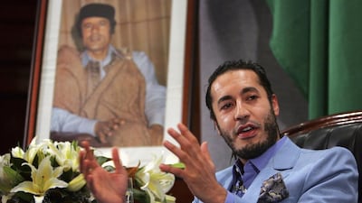 Saadi Qaddafi, the third son of Libyan leader Muammar Qaddafi, speaks at a news conference in Sydney in 2005. Tim Wimborne / Reuters / 2005